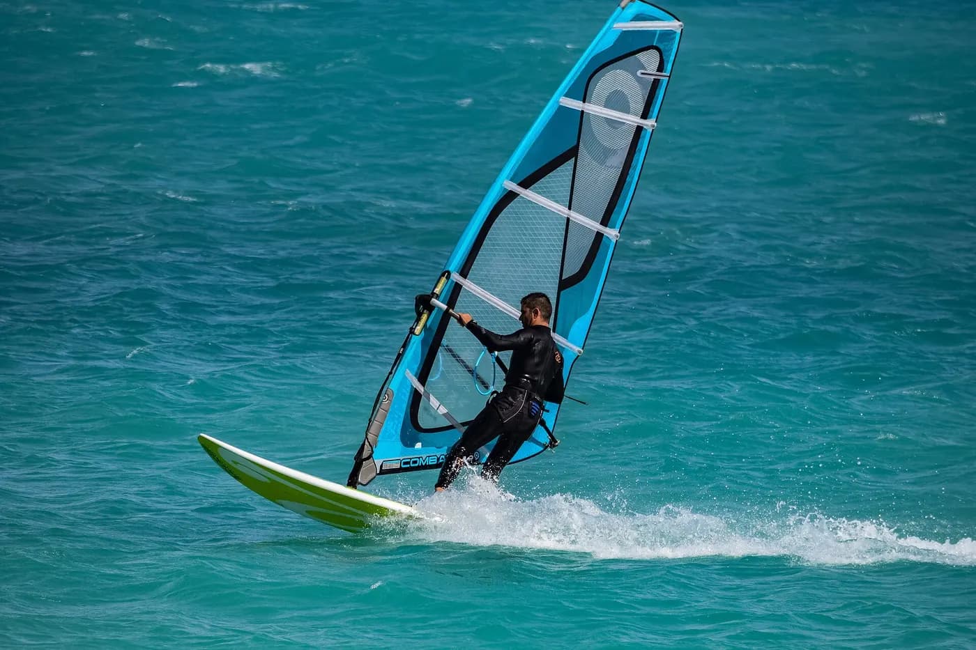 Windsurfer planing on open water