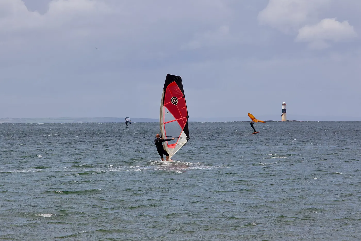 Windsurfer on a freeride sail in choppy coastal wind